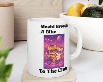 Mochi Brought A Bike To The Club Mug, Cute Cat Coffee Mug, Feline Friends Gift, Purrfect for Cat Lovers, Adorable Mug for Every Occasion
