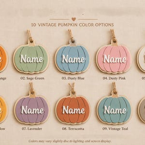 May include: Ten pumpkin-shaped wooden ornaments with jute twine loops, each featuring the word Name in white script. Colors include pumpkin orange, sage green, dusty blue, dusty pink, vintage cream, mustard yellow, lavender, terracotta, vintage teal, and taupe gray.