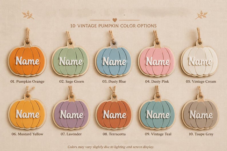 May include: Ten pumpkin-shaped wooden ornaments with jute twine loops, each featuring the word Name in white script. Colors include pumpkin orange, sage green, dusty blue, dusty pink, vintage cream, mustard yellow, lavender, terracotta, vintage teal, and taupe gray.