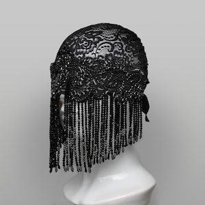 Zwart masker met doorzichtige kralen, franje en kristallen versiering - Art Deco-zendspoel