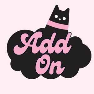 May include: A black cat with a pink collar and white eyes peeks over a black cloud. The words "Add On" are written in pink, stylized script within the cloud. The background is a soft pink color.