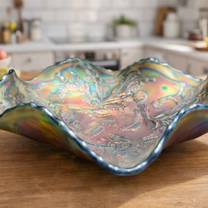 May include: A set of three ceramic mugs with a speckled, matte finish. Each mug features a different color: light blue, cream, and gray. The mugs have a simple, modern design and a comfortable handle.