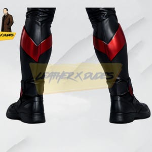 May include: Black leather boots and leggings with red accents. The leggings have a red chevron design on the upper calf. The boots are black with a low heel. The image includes the text "LEATHER X DUDES".
