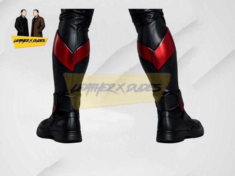 May include: Black leather boots and leggings with red accents. The leggings have a red chevron design on the upper calf. The boots are black with a low heel. The image includes the text "LEATHER X DUDES".