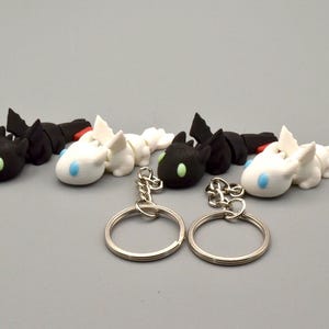 Toothless & Lightfury Keychains- 3d Printed Dragons HTTYD- glow in the dark eyes