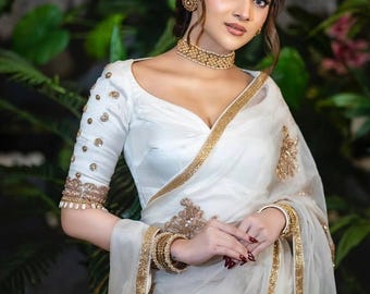 Exclusive Muslin Zardosi saree in white. color can be customized