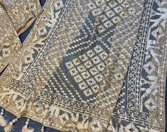 pure Sophura Muslin saree in jamdani motif Golden beige color.