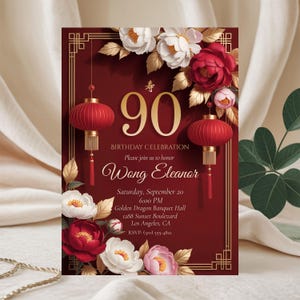May include: A red and gold 90th birthday celebration invitation with floral and lantern accents. The invitation includes the text "Wong Eleanor" and event details. The design features red, white, and gold colours.
