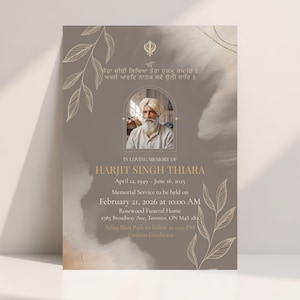 May include: A memorial card with a photo of a man in a turban, surrounded by text and floral designs. The card is in shades of brown and gold, with the text "In Loving Memory of Harjit Singh Thiara".