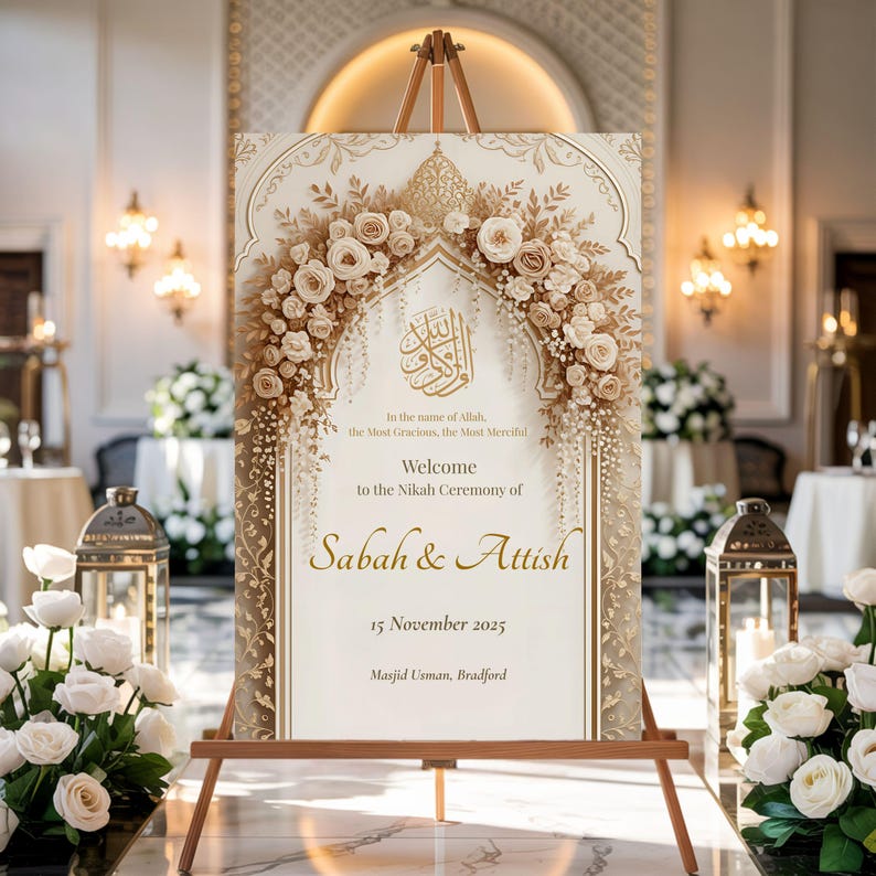 Elegant gold floral Nikah welcome sign on wooden easel in a classic wedding hall with lanterns and flowers.