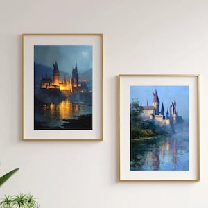 May include: Two framed art prints depicting a castle at night, with golden light reflecting on the water. The artwork features a dark blue and gold color palette, with a focus on the castle's architecture and the surrounding landscape. The frames are gold.
