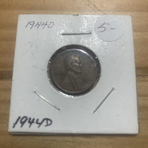 Moneda de un centavo de trigo de bronce de Lincoln de 1944, en condiciones de circulación promedio