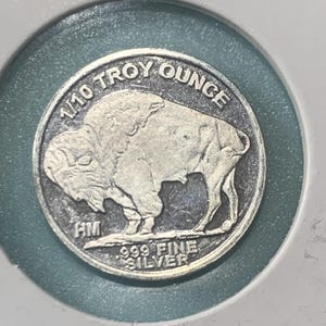 1/10 oz buffel Indisch zilver rond, 9999 fijnzilver