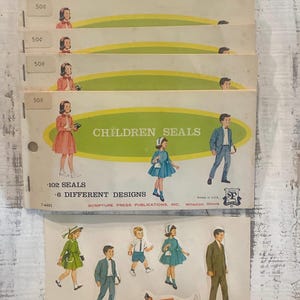 May include: Vintage "Children Seals" sticker sheets. Each sheet features illustrations of children in various outfits. The sheets are labeled with "102 SEALS" and "6 DIFFERENT DESIGNS". The price is marked as "50¢" on each sheet.