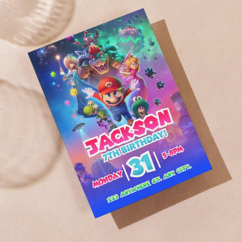 May include: A colorful birthday invitation featuring Mario and other characters from the Super Mario Bros. movie. The invitation reads "Jackson 7th Birthday!" with the date and time. The invitation is on a blue background with a brown envelope.