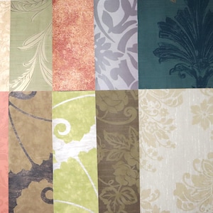 May include: A collection of ten rectangular wallpaper samples arranged in a grid. The patterns include cream floral damask, sage green leaves, textured terracotta, lavender swirls, dark teal botanical prints, coral damask, brown swirls, lime green foliage, olive floral motifs, and a large-scale cream floral damask.