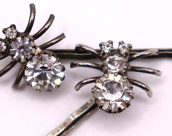 Vintage zilveren spinhaarspelden, paar metaal- en strass spinachtige haarsieraden