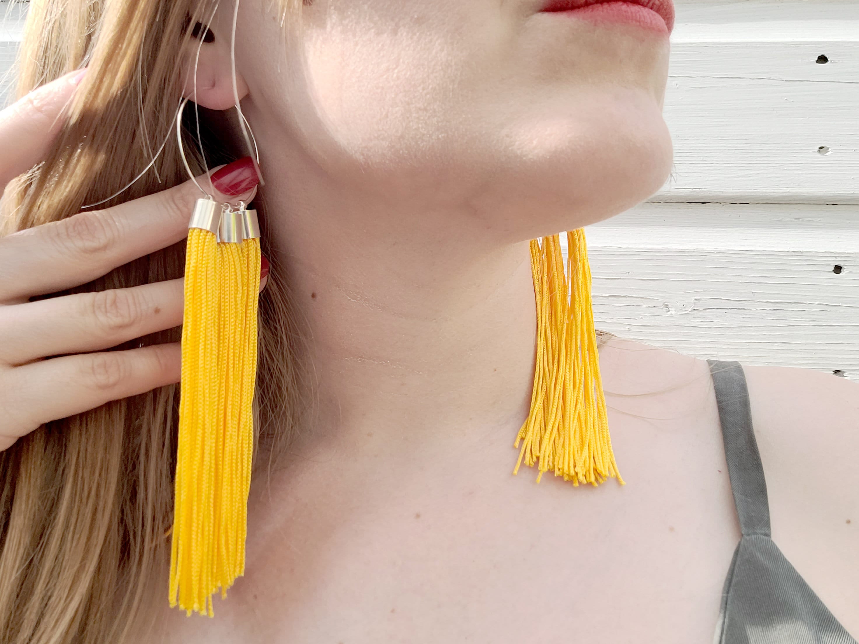 Fun aqua blue and yellow-gold tassel earrings | MakerPlace by Michaels