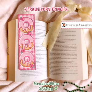 May include: A white ceramic mug with a black handle and the text "But First, Coffee" in a handwritten style. The mug is on a white surface. The mug is approximately 4 inches tall.