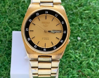 Vintage seiko 5 7009 Automatic 17 jewels men wristwatch gold dial made in japan