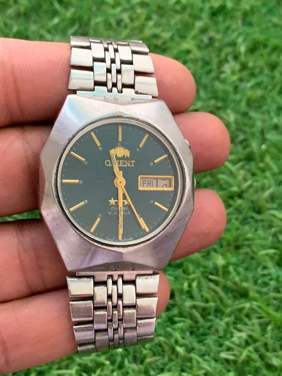 Vintage Orient Tri Star Crystal Automatic Watch: Green Dial, Day