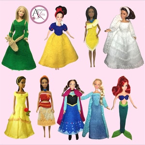 May include: A selection of Barbie dolls wearing handmade knitted princess-themed outfits. The dolls showcase a variety of colours and designs, including green, yellow, blue, and white dresses, and a mermaid tail. The dolls are displayed against a pink backdrop.