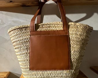 handmade straw tote bag with brown leather handles and front pocket moroccan basket summer beach bag