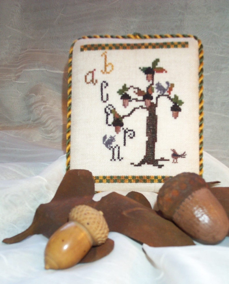 A is for Acorn designed by Dames of the Needle