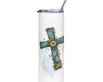 May include: White tumbler with a teal cross design adorned with yellow sunflowers and green vines. The cross has a wooden texture. A stainless steel straw and lid complete the design. The tumbler has a watercolor background.