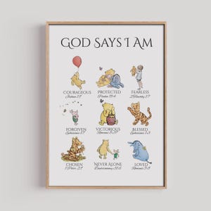 May include: A framed print featuring illustrations of Winnie the Pooh characters with inspirational text. The words "God Says I Am" are at the top, with phrases like "Courageous" and "Protected" below the characters. The print is in a wooden frame.