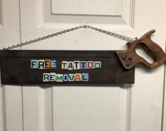 License Plate Saw - Free Tattoo Removal