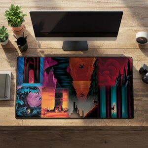 May include: A rectangular mouse mat with a colourful fantasy landscape design. The artwork is split into panels, each showing a different scene with vibrant colours and stylised elements. The mouse mat is on a wooden desk, surrounded by office supplies, including a computer monitor.