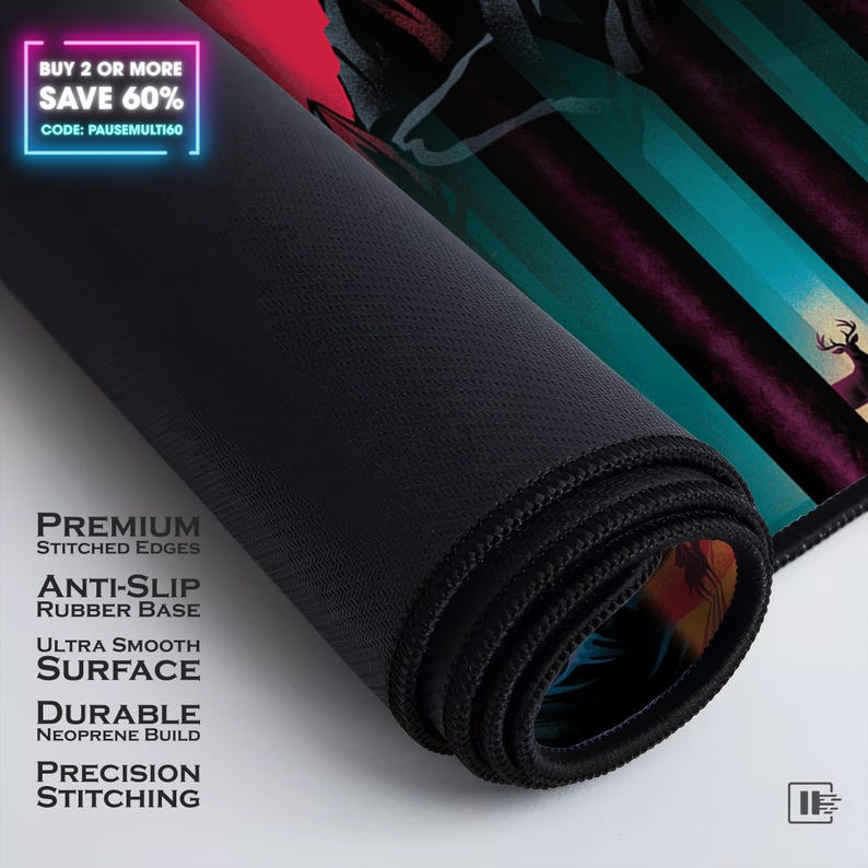 May include: Rolled-up black mouse mat with a forest scene design. The mouse mat features a black anti-slip rubber base, premium stitched edges, and a smooth surface. Text on the mouse mat includes "Buy 2 or more Save 60%" and "Premium Stitched Edges".