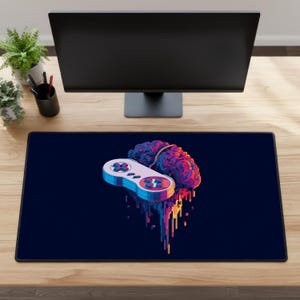 Może przedstawiać: Prostokątna podkładka pod mysz z ciemnoniebieskim tłem. Zawiera kolorową grafikę kontrolera do gier wideo i mózgu. Kontroler jest biało-czerwony, a mózg fioletowo-różowy. Projekt ma pikselowy, cyfrowy styl artystyczny.