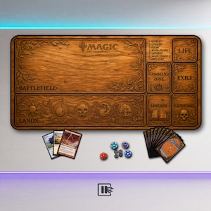 May include: A rectangular Magic: The Gathering playmat with a wood grain texture, featuring designated zones for Battlefield, Lands, Life, Command Zone, Library, and Graveyard. Includes three playing cards, a deck of cards, and six dice.