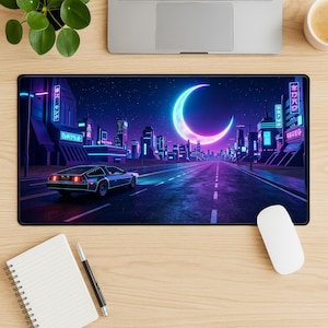 May include: A rectangular mouse pad featuring a futuristic cityscape with a crescent moon in the night sky. A silver car drives down a road. The buildings and signs are illuminated with neon lights in shades of blue and purple.