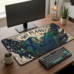 May include: A rectangular desk mat featuring a graphic illustration of a skeleton lounging in a green armchair, holding a mug. The text reads MY PLANS? COFFEE. The design includes bookshelves, small ghosts, stars, and moons in shades of blue, green, and cream.