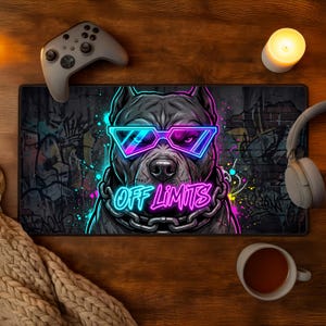 May include: A rectangular gaming mousepad featuring a stylized pit bull wearing neon blue and pink sunglasses. The words "OFF LIMITS" are displayed in neon lettering. The background includes graffiti art and a brick wall.