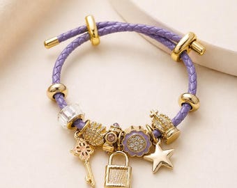 Lilac bracelet with gold charms