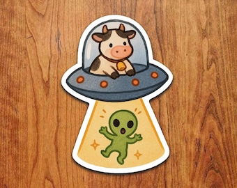 Sticker koe ontvoerende alien – grappige kawaii ufo-vinylsticker