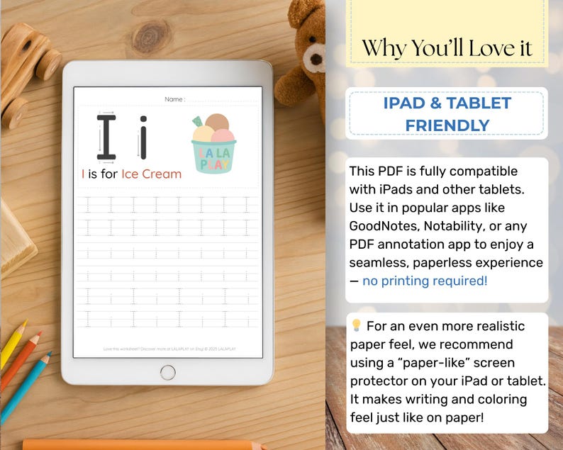 May include: A white tablet showing a digital worksheet for the letter "I" with an ice cream illustration. The text "I is for Ice Cream" is visible. The tablet is on a wooden surface with colored pencils and a toy car.