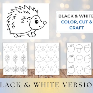 May include: Black and white printable craft set featuring a hedgehog, leaves, apples, mushrooms, and acorns. The set includes the text "BLACK & WHITE: COLOR, CUT & CRAFT" and "BLACK & WHITE VERSION".