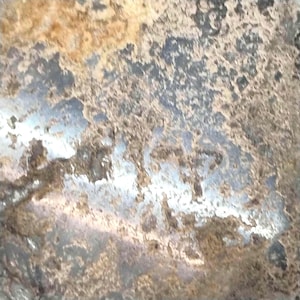 platinum nugget in quartz. 499.5 grams also contains some gold.
