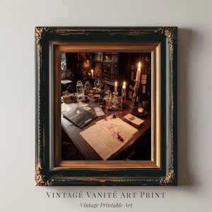 May include: Framed vintage art print featuring a detailed interior scene. A wooden desk is laden with books, candles, and bottles. The print is in a black and gold ornate frame. Text at the bottom reads "VINTAGE VANITÉ ART PRINT" and "Vintage Printable Art."