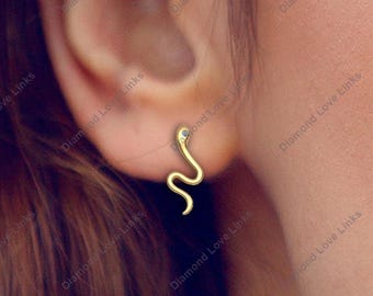 Orecchini a forma di serpente in oro 14k e diamanti - Italia