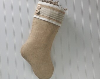 2 wood buttons on a natual burlap stocking with gold and cream accents