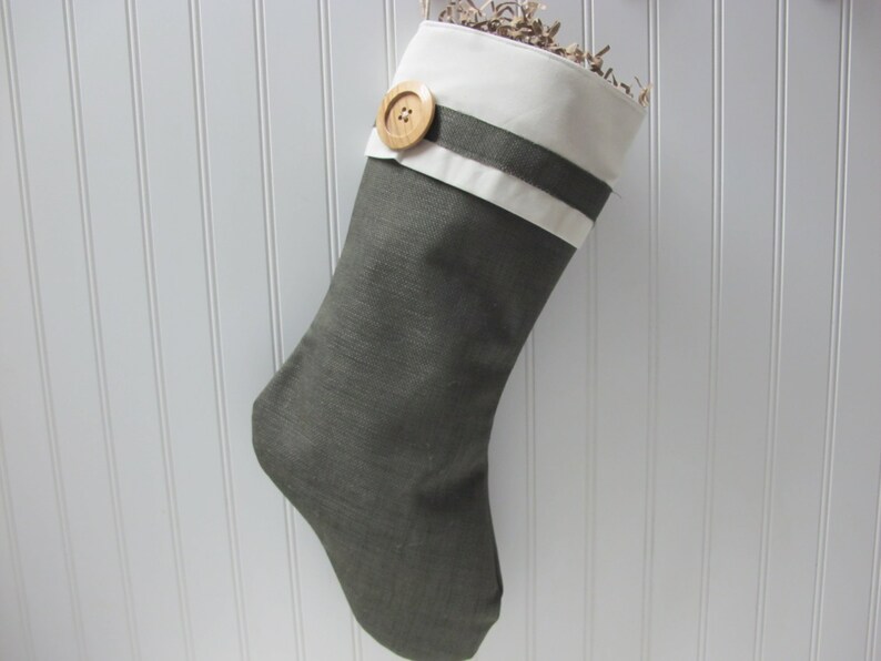 Green burlap stocking with large wood button image 1