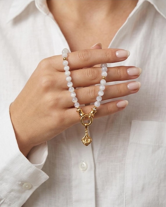 Elegant moonstone pearl necklace with petunia flower pendant