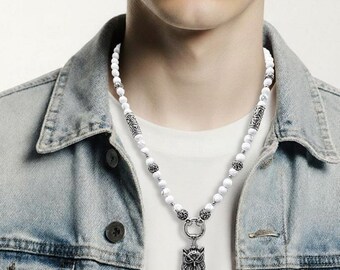 Unisex pearl necklace made of white howlite, stainless steel elements and stainless steel pendant