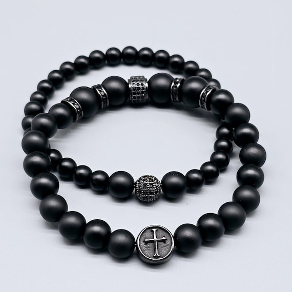 Unisex beaded bracelet as a set made of onyx stone or magnesite turquoise with stainless steel elements.